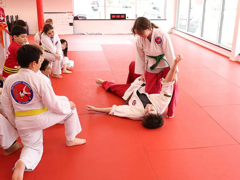 kids in MetroWest martial arts class improving focus, discipline, and listening skills through martial arts training